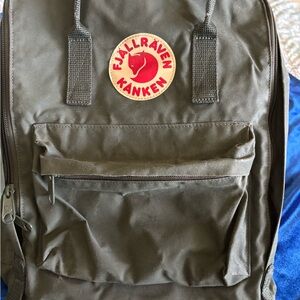 Fjallraven Kånken Backpack in Olive Green with Red Logo